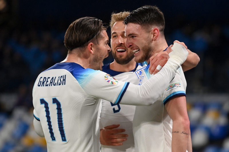 NAPLES, ITALY - MARCH 23: Declan Rice of England celebrates with team mates Jack Grealish and Harry Kane after scoring their sides first goal during the UEFA EURO 2024 qualifying round group C match between Italy and England at Stadio Diego Armando Maradona on March 23, 2023 in Naples, Italy. (Photo by Michael Regan/Getty Images)
