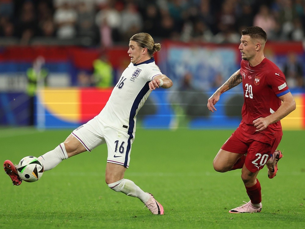 GELSENKIRCHEN, GERMANY: Conor Gallagher of England and Sergej Milinkovic-Savic of Serbia during the UEFA EURO 2024 group stage match between Serbia and England at Arena AufSchalke on June 16, 2024. (Photo by Richard Pelham/Getty Images)