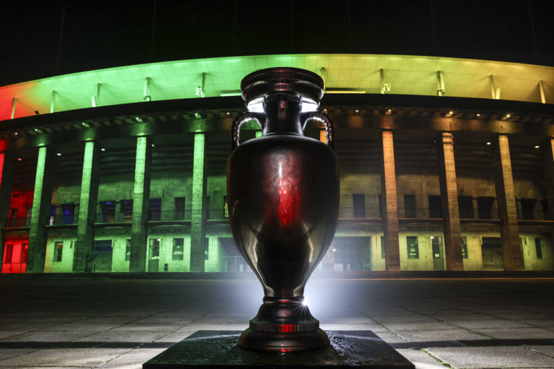 BERLIN, GERMANY - OCTOBER 05: A replica of the UEFA Euro trophy is displayed after a presentation of the new UEFA Euro 2024 football championship logo at Olympiastadion on October 05, 2021 in Berlin, Germany. (Photo by Maja Hitij/Getty Images)