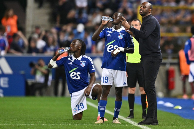 Strasbourg's French head coach Patrick Vieira (R) reacts next to Strasbourg's French defender #29 Ismael Doukoure (L) and Strasbourg's Malian midfielder #19 Habib Diarra (C) during the French L1 football match between RC Strasbourg Alsace and FC Metz at the Stade de la Meinau in Strasbourg, eastern France, on May 12, 2024. (Photo by SEBASTIEN BOZON/AFP via Getty Images)