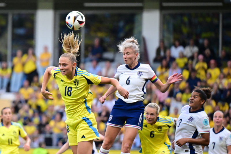 Sweden's forward #18 Fridolina Rolfo and England's midfielder #06 Leah Williamson vie for the ball during the UEFA women's Euro 2025 qualifying soccer match league A, group 3 between Sweden and England at Gamla Ullevi in Gothenburg, Sweden, on July 16, 2024. (Photo by BJORN LARSSON ROSVALL/TT News Agency/AFP via Getty Images)