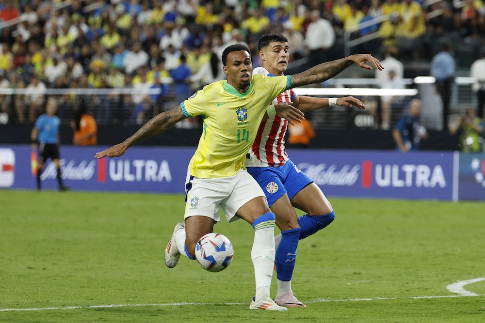 LAS VEGAS, NEVADA: Gabriel Magalhaes of Brazil and Ramon Sosa of Paraguay battle for the ball during the CONMEBOL Copa America 2024 Group D match between Paraguay and Brazil at Allegiant Stadium on June 28, 2024. (Photo by Kevork Djansezian/Getty Images)