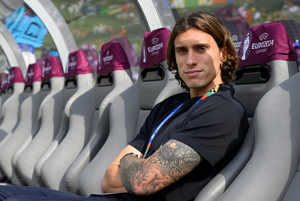 BERLIN, GERMANY: Riccardo Calafiori of Italy looks on prior to the UEFA EURO 2024 round of 16 match between Switzerland and Italy at Olympiastadion on June 29, 2024. (Photo by Claudio Villa/Getty Images for FIGC)