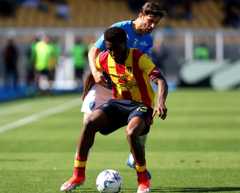 LECCE, ITALY - APRIL 13: Patrick Dorgu of Lecce competes for the ball with Bartosz Bereszynski of Empoli during the Serie A TIM match between US Lecce and Empoli FC at Stadio Via del Mare on April 13, 2024 in Lecce, Italy. (Photo by Maurizio Lagana/Getty Images)