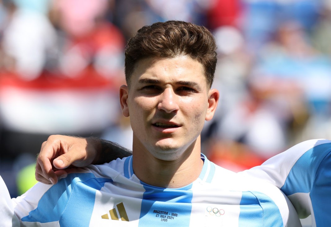 LYON, FRANCE - JULY 27: Julian Alvarez #9 of Team Argentina sings the national anthem prior to the Men's group B match between Argentina and Iraq during the Olympic Games Paris 2024 at Stade de Lyon on July 27, 2024 in Lyon, France. (Photo by Claudio Villa/Getty Images)