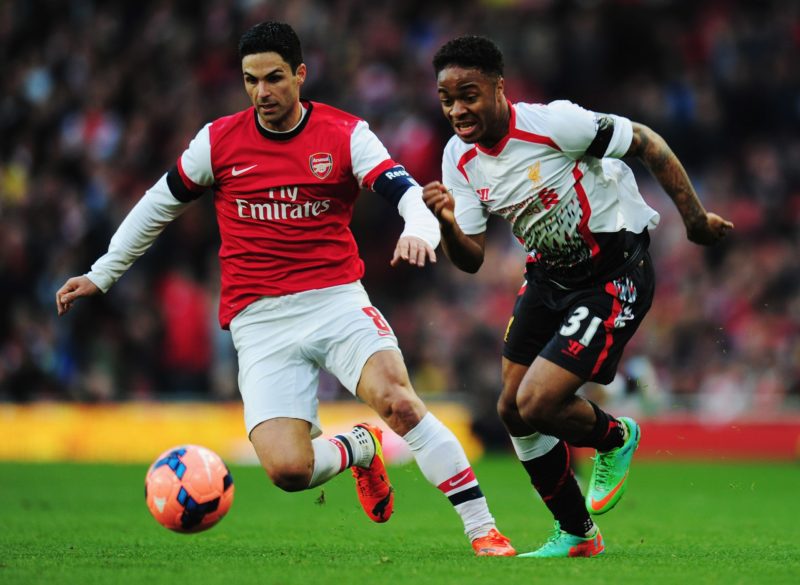 LONDON, ENGLAND - FEBRUARY 16: Raheem Sterling (R) of Liverpool holds off the challenge of Mikel Arteta (L) of Arsenal during the FA Cup Fifth Round match between Arsenal and Liverpool at the Emirates Stadium on February 16, 2014 in London, England. (Photo by Shaun Botterill/Getty Images)