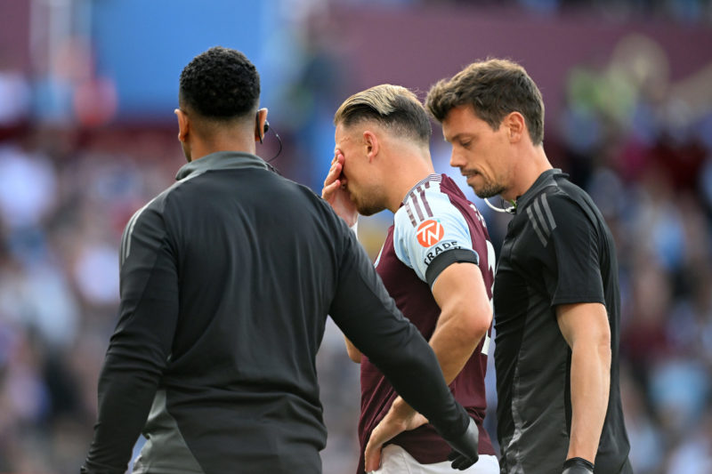 BIRMINGHAM, ENGLAND - AUGUST 24: Matty Cash of Aston Villa leaves the field due to a injury during the Premier League match between Aston Villa FC and Arsenal FC at Villa Park on August 24, 2024 in Birmingham, England. (Photo by Clive Mason/Getty Images)