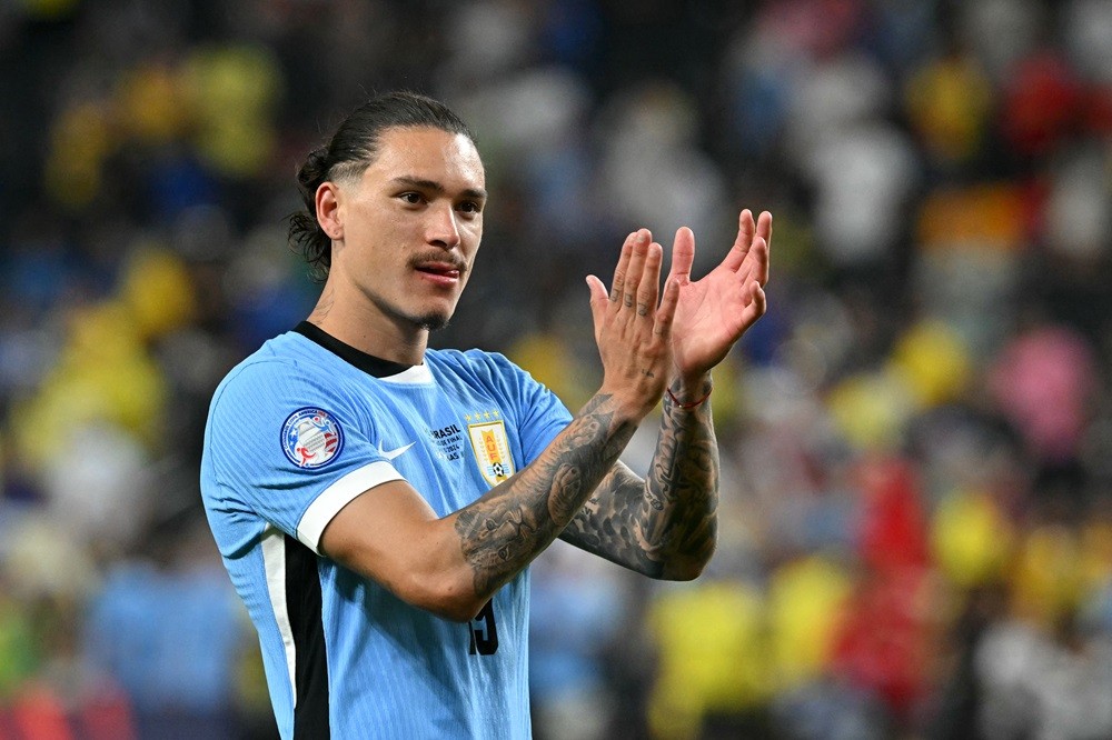 Uruguay's Darwin Nunez acknowledges supporters following his team's victory in the Conmebol 2024 Copa America tournament quarter-final football match between Uruguay and Brazil at Allegiant Stadium in Las Vegas, Nevada on July 6, 2024. (Photo by FREDERIC J. BROWN/AFP via Getty Images)