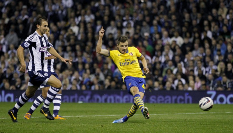 Arsenal's German midfielder Thomas Eisfeld (R) shoots to score a goal during the League Cup football match between West Bromwich Albion and Arsenal at The Hawthorns in West Bromwich on September 25, 2013. (Photo credit IAN KINGTON/AFP via Getty Images)