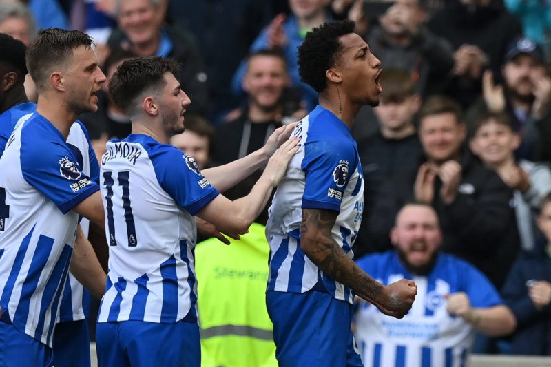 Brighton's Brazilian striker #09 Joao Pedro (R) celebrates after scoring the opening goal during the English Premier League football match between Brighton and Hove Albion and Aston Villa at the American Express Community Stadium in Brighton, southern England on May 5, 2024. (Photo by GLYN KIRK/AFP via Getty Images)