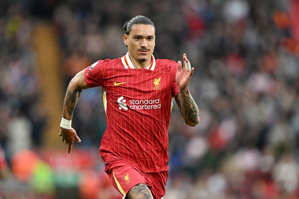 LIVERPOOL, ENGLAND: Darwin Nunez of Liverpool in action during the Premier League match between Liverpool FC and Brentford FC at Anfield on August 25, 2024. (Photo by Michael Regan/Getty Images)