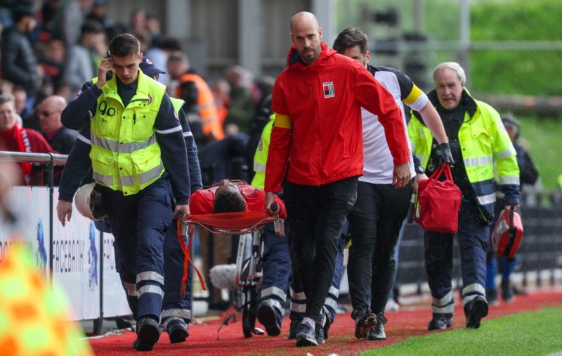 Rwdm's Jeff Reine-Adelaide leaves the pitch after being injured during a soccer match between RWD Molenbeek and Sporting Charleroi, Saturday 04 May 2024 in Charleroi, on day 5 of the 2023-2024 'Jupiler Pro League - Relegation Play-offs. (Photo by VIRGINIE LEFOUR/BELGA MAG/AFP via Getty Images)