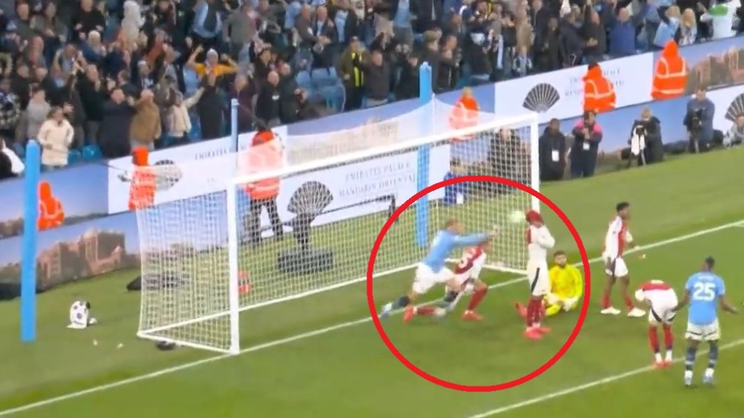 Erling Haaland throws the ball at Gabriel Magalhaes during Arsenal's match against Manchester City (Image via Arsenal.com)