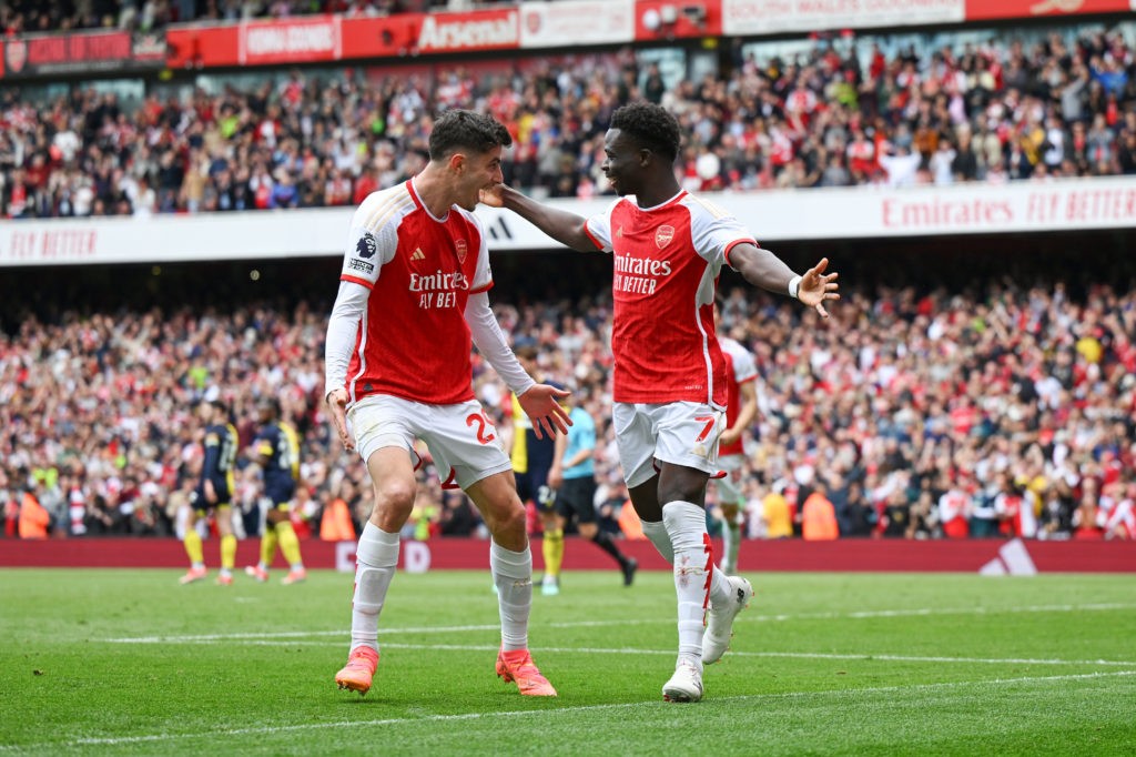 LONDON, ENGLAND - MAY 04: Bukayo Saka of Arsenal celebrates scoring his team's first goal from a penalty kick with teammate Kai Havertz during the Premier League match between Arsenal FC and AFC Bournemouth at Emirates Stadium on May 04, 2024 in London, England. (Photo by Shaun Botterill/Getty Images)