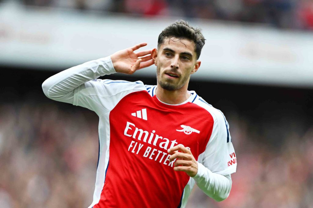 LONDON, ENGLAND - AUGUST 31: Kai Havertz of Arsenal celebrates scoring his team's first goal during the Premier League match between Arsenal FC and Brighton & Hove Albion FC at Emirates Stadium on August 31, 2024 in London, England. (Photo by Mike Hewitt/Getty Images)