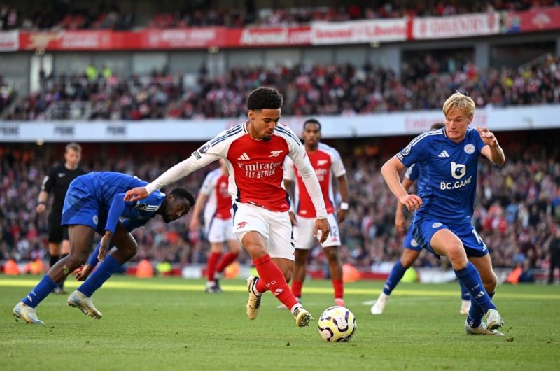 LONDON, ENGLAND: Ethan Nwaneri of Arsenal rtakes on Victor Kristiansen of Leicester City during the Premier League match between Arsenal FC and Leicester City FC at Emirates Stadium on September 28, 2024. (Photo by Shaun Botterill/Getty Images)