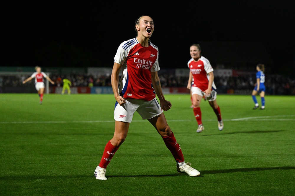 BOREHAMWOOD, ENGLAND: Caitlin Foord of Arsenal celebrates scoring her team's fourth goal during the UEFA Women's Champions League 2024/25 First Round Mini-Tournament match between Arsenal FC and Rangers FC at Meadow Park on September 04, 2024. (Photo by Justin Setterfield/Getty Images)