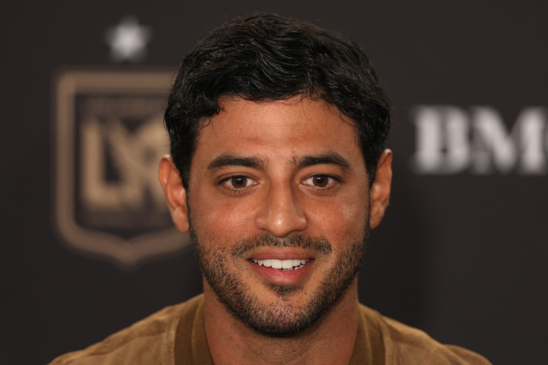 LOS ANGELES, CALIFORNIA - SEPTEMBER 18: Carlos Vela #10 of Los Angeles Football Club reacts during a press conference prior to the match between Austin FC and Los Angeles Football Club at BMO Stadium on September 18, 2024 in Los Angeles, California. Carlos Vela has been re-signed to LAFC. (Photo by Kaelin Mendez/Getty Images)