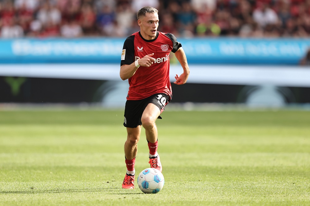 LEVERKUSEN, GERMANY: Florian Wirtz of Leverkusen runs with the ball during the Bundesliga match between Bayer 04 Leverkusen and VfL Wolfsburg at BayArena on September 22, 2024. (Photo by Christof Koepsel/Getty Images)