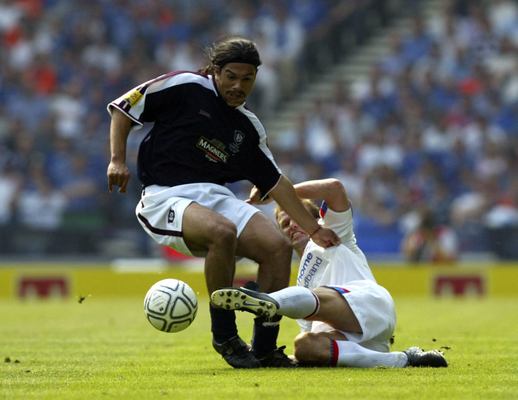 GLASGOW, SCOTLAND: Fabian Caballero of Dundee battles with Arthur Numan of Rangers during the Tennant's Scottish FA Cup Final match between Dundee United and Glasgow Rangers on May 31, 2003. (Photo By Ben Radford/Getty Images)