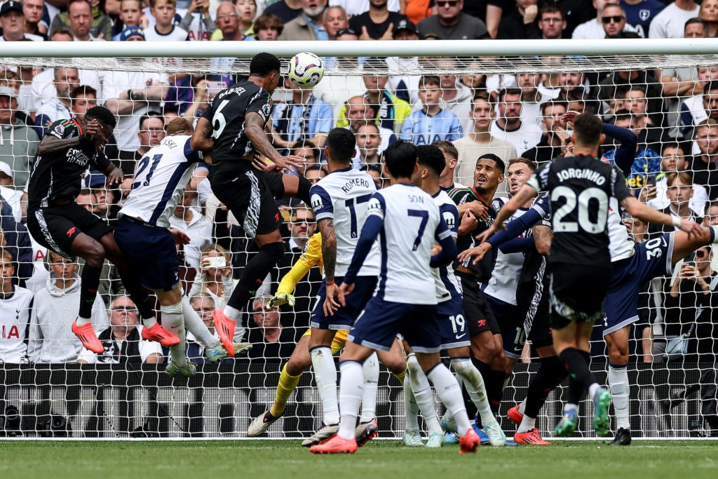 Arsenal's Brazilian defender #06 Gabriel Magalhaes scores the team's first goal during the English Premier League football match between Tottenham Hotspur and Arsenal at the Tottenham Hotspur Stadium in London, on September 15, 2024. (Photo by ADRIAN DENNIS/AFP via Getty Images)