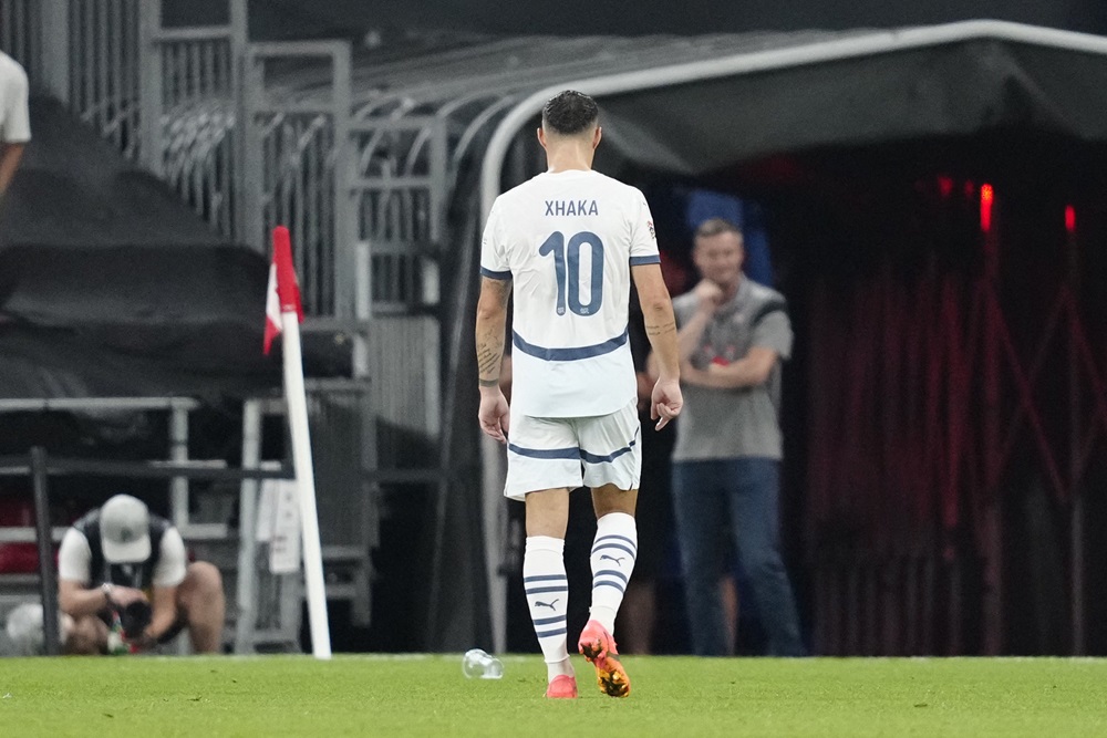 Switzerland's Granit Xhaka walks out of the pitch after getting shown a red card during the UEFA Nations League football match League A, Group A4, Day 1, Denmark v Switzerland in the Parken stadium in Copenhagen, Denmark, on September 5, 2024. (Photo by MADS CLAUS RASMUSSEN/Ritzau Scanpix/AFP via Getty Images)