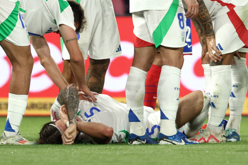 Italy's defender #05 Riccardo Calafiori lies on the football pitch during the UEFA Nations League Group A2 football match between France and Italy at the Parc des Princes in Paris on September 6, 2024. (Photo by FRANCK FIFE/AFP via Getty Images)