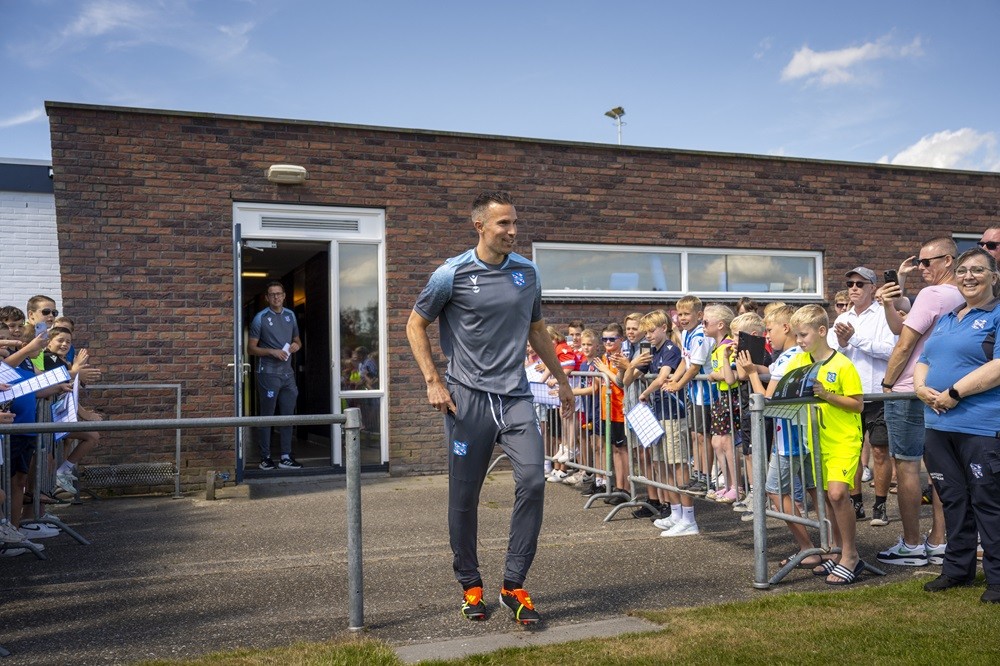 Robin van Persie (C) walks in front of fans on the day of his first training as head coach of SC Heerenveen in Heerenveen, on June 29, 2024. (Photo by JILMER POSTMA/ANP/AFP via Getty Images)