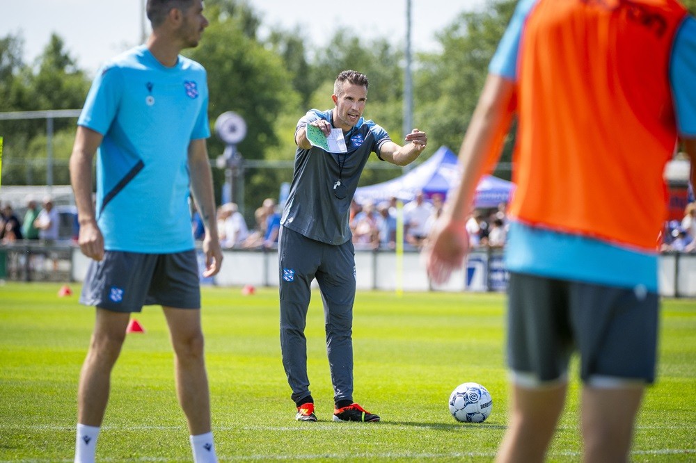 Robin van Persie (C) talks to the players during his first training as head coach of SC Heerenveen in Heerenveen, on June 29, 2024. (Photo by JILMER POSTMA/ANP/AFP via Getty Images)