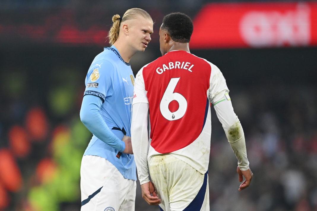 MANCHESTER, ENGLAND - SEPTEMBER 22: Erling Haaland of Manchester City speaks to Gabriel of Arsenal during the Premier League match between Manchester City FC and Arsenal FC at Etihad Stadium on September 22, 2024 in Manchester, England. (Photo by Michael Regan/Getty Images)