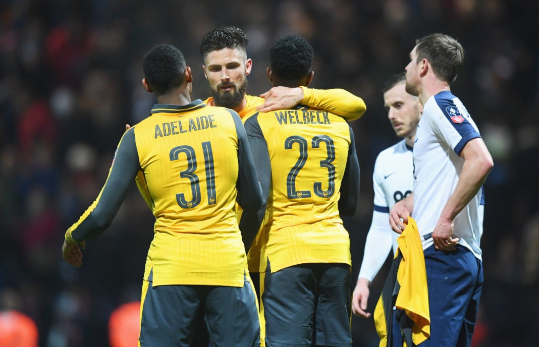 PRESTON, ENGLAND - JANUARY 07: Olivier Giroud of Arsenal celebrates victory with Jeff Reine-Adelaide (31) and Danny Welbeck of Arsenal (23) after the Emirates FA Cup Third Round match between Preston North End and Arsenal at Deepdale on January 7, 2017 in Preston, England. (Photo by Michael Regan/Getty Images)