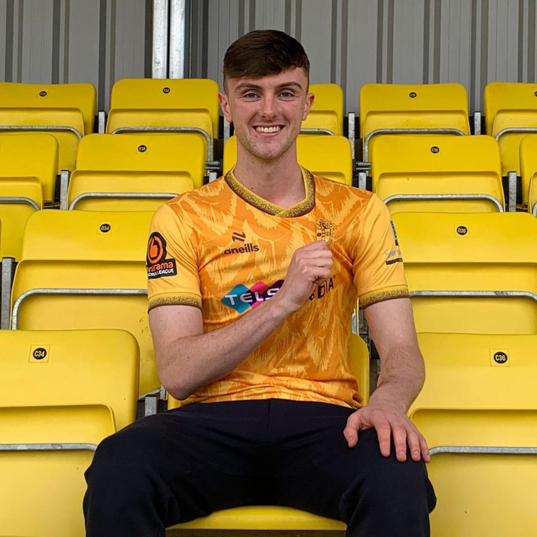 Alex Kirk after signing for Sutton United (Photo via Sutton United)