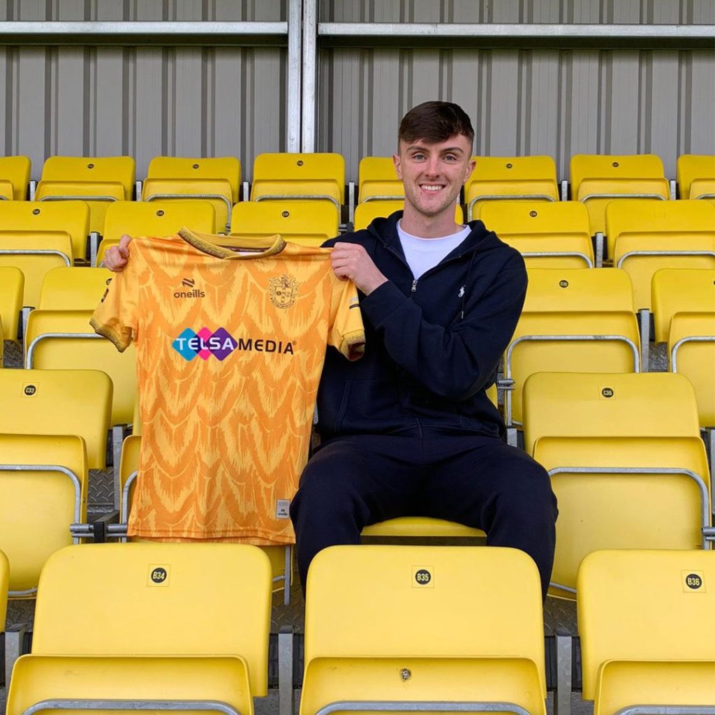 Alex Kirk after signing for Sutton United (Photo via Sutton United)