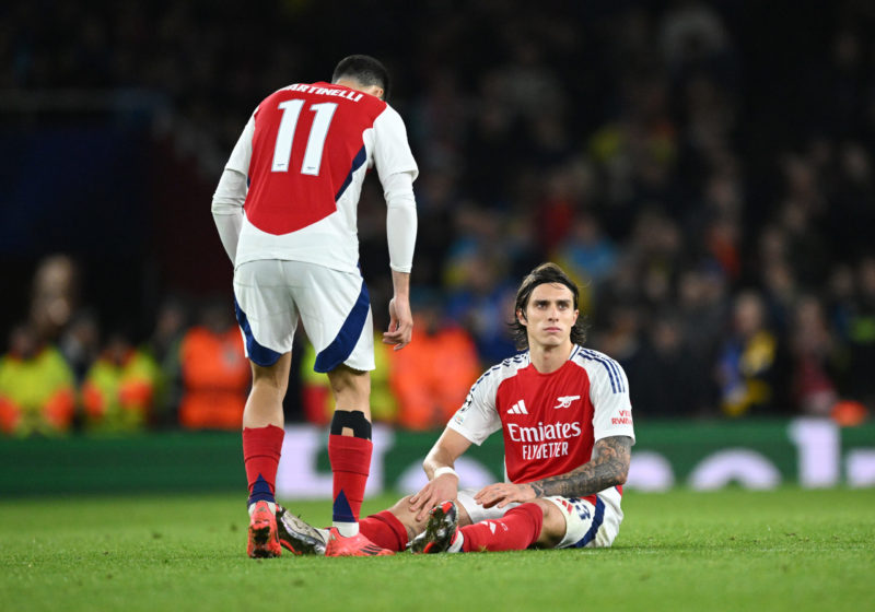 LONDON, ENGLAND - OCTOBER 22: Riccardo Calafiori of Arsenal goes down with a injury as Gabriel Martinelli of Arsenal checks on him during the UEFA Champions League 2024/25 League Phase MD3 match between Arsenal FC and FC Shakhtar Donetsk at Emirates Stadium on October 22, 2024 in London, England. (Photo by Justin Setterfield/Getty Images)