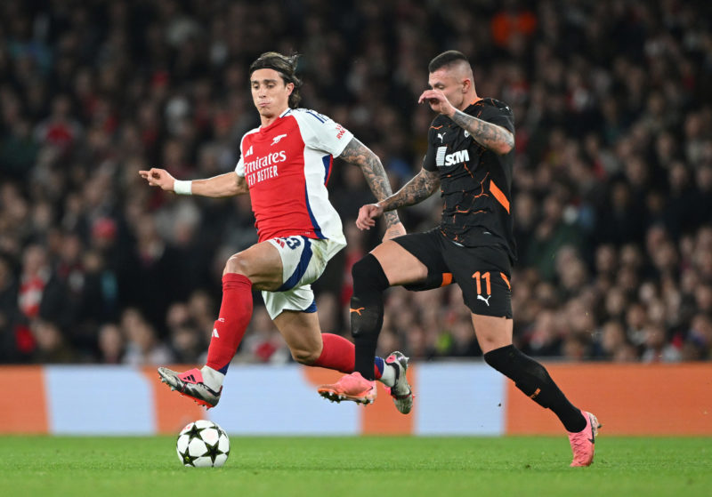 LONDON, ENGLAND - OCTOBER 22: Riccardo Calafiori of Arsenal battles for possession with Oleksandr Zubkov of FC Shakhtar Donetsk during the UEFA Champions League 2024/25 League Phase MD3 match between Arsenal FC and FC Shakhtar Donetsk at Emirates Stadium on October 22, 2024 in London, England. (Photo by Shaun Botterill/Getty Images)