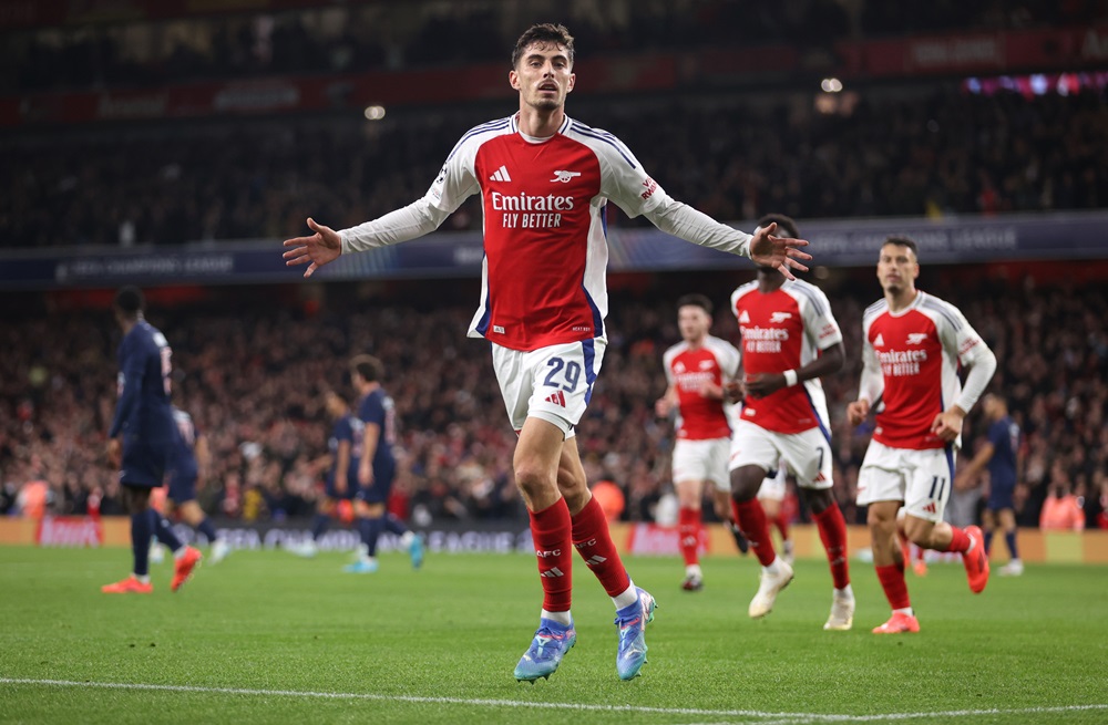 LONDON, ENGLAND: Kai Havertz of Arsenal celebrates scoring during the UEFA Champions League 2024/25 League Phase MD2 match between Arsenal FC and Paris Saint-Germain at Emirates Stadium on October 01, 2024. (Photo by Julian Finney/Getty Images)