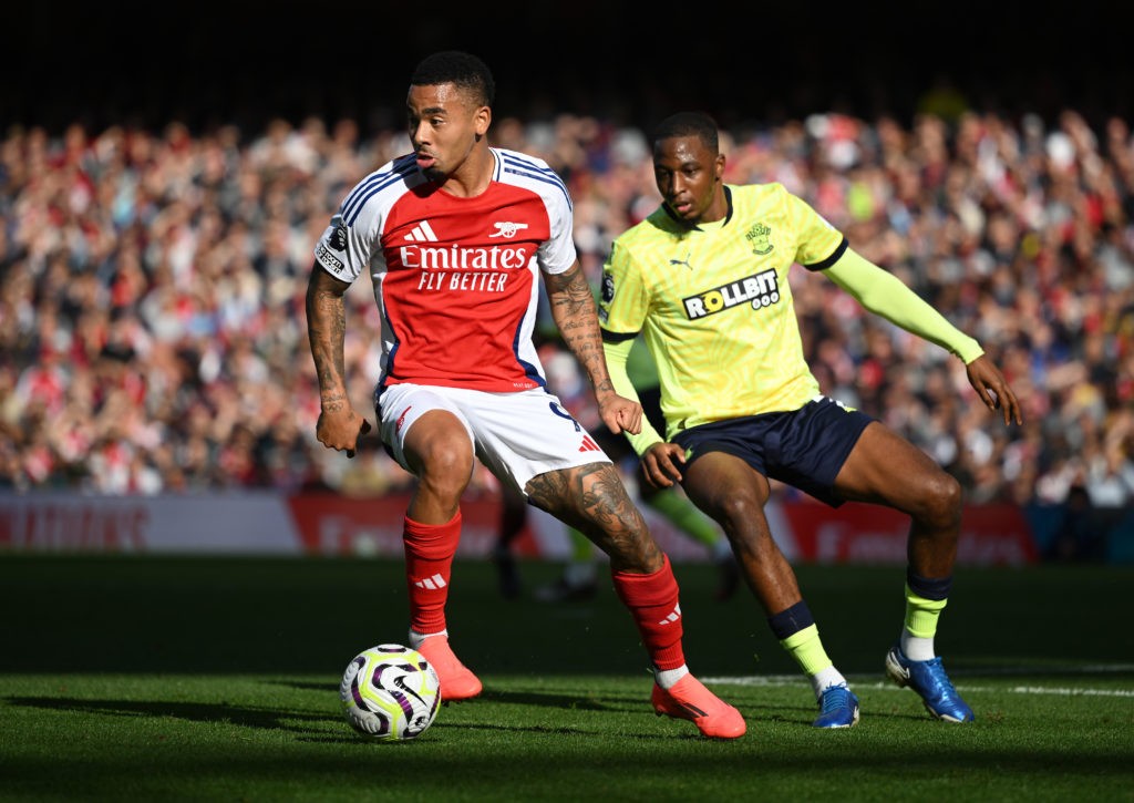 LONDON, ENGLAND: Gabriel Jesus of Arsenal runs with the ball under pressure from Joe Aribo of Southampton during the Premier League match between Arsenal FC and Southampton FC at Emirates Stadium on October 05, 2024. (Photo by Clive Mason/Getty Images)