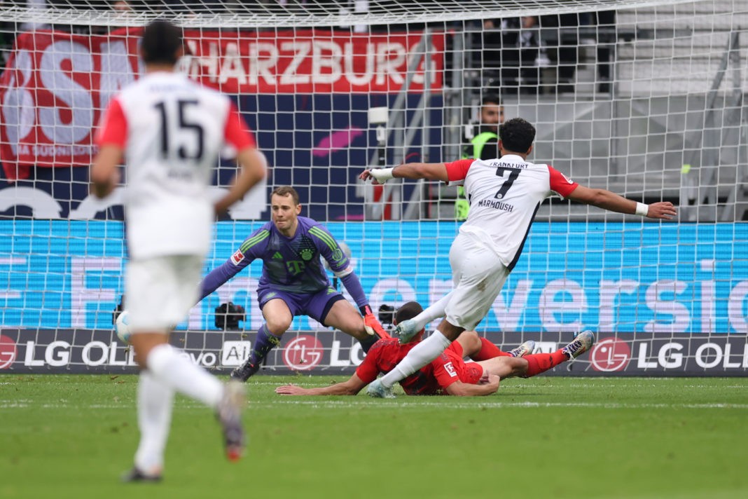 FRANKFURT AM MAIN, GERMANY - OCTOBER 06: Omar Marmoush of Eintracht Frankfurt scores the team's second goal past goalkeeper Manuel Neuer of Bayern Muenchen during the Bundesliga match between Eintracht Frankfurt and FC Bayern München at Deutsche Bank Park on October 06, 2024 in Frankfurt am Main, Germany. (Photo by Alex Grimm/Getty Images)