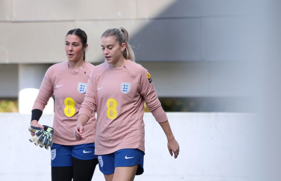 BURTON-UPON-TRENT, ENGLAND - OCTOBER 22: Mary Earps and Alessia Russo of England walk out ahead of a training session at St Georges Park on October 22, 2024 in Burton-upon-Trent, England. (Photo by Morgan Harlow/Getty Images)