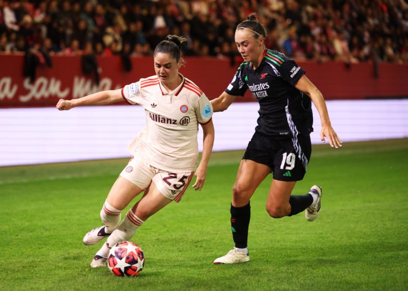 MUNICH, GERMANY - OCTOBER 09: Sarah Zadrazil of Bayern Munich is challenged by Caitlin Foord of Arsenal during the UEFA Women's Champions League match between FC Bayern München and Arsenal FC at FC Bayern Campus on October 09, 2024 in Munich, Germany. (Photo by Adam Pretty/Getty Images)