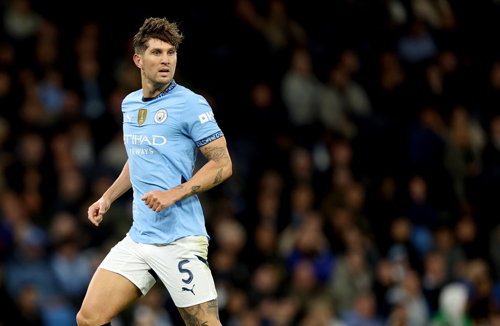 MANCHESTER, ENGLAND: Manchester City's John Stones during the Carabao Cup Third Round match between Manchester City and Watford at Etihad Stadium on September 24, 2024. (Photo by Carl Recine/Getty Images)