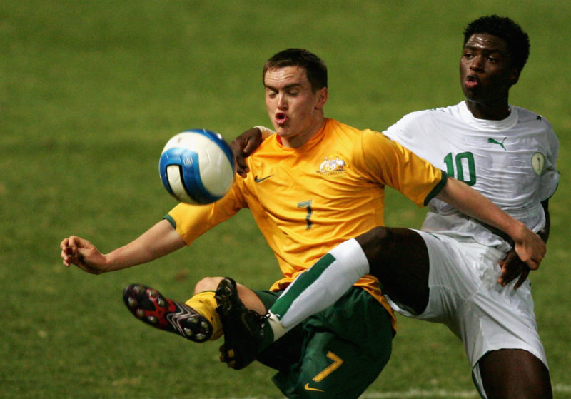 ADELAIDE, AUSTRALIA - MARCH 28: Neil Kilkenny of Australia and Motaz Sidiq E Almosa of Saudi Arabia fight for the ball during the Olympic Qualification match between Australia Under 23 and Saudi Arabia at Hindmarsh Stadium March 28, 2007 in Adelaide, Australia. (Photo by James Knowler/Getty Images)