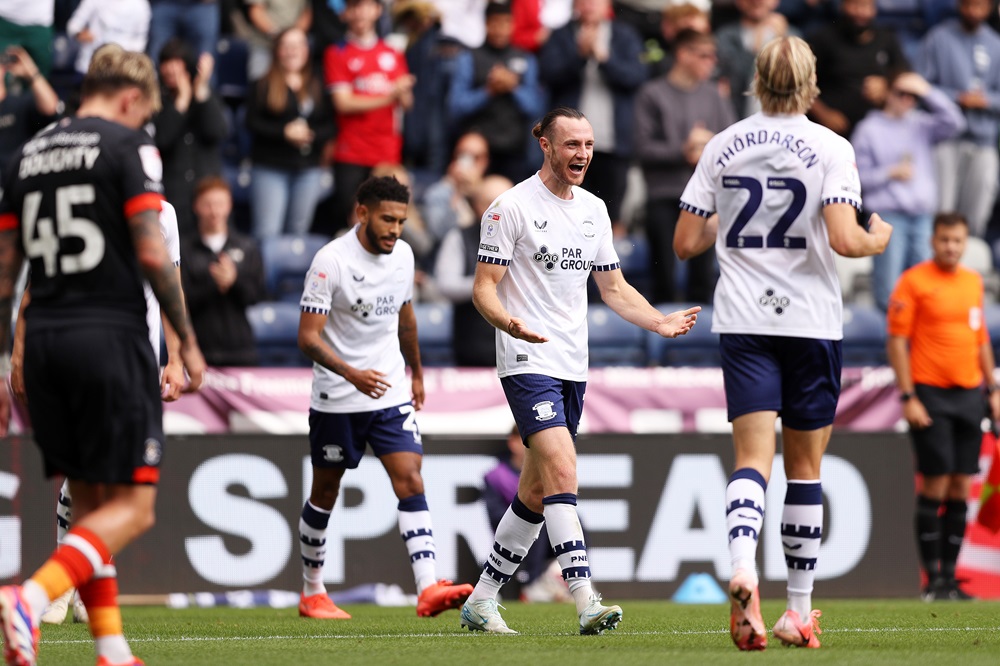 PRESTON, ENGLAND: Will Keane of Preston North End celebrates scoring his team's first goal during the Sky Bet Championship match between Preston North End FC and Luton Town FC at Deepdale on August 24, 2024. (Photo by Charlotte Tattersall/Getty Images)