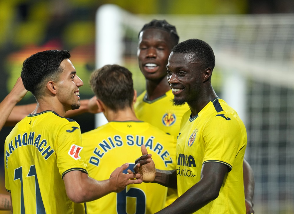 VILLARREAL, SPAIN: Nicolas Pepe of Villarreal CF celebrates scoring his team's first goal with teammate Ilias Akhomach during the LaLiga match between Villarreal CF and UD Las Palmas at Estadio de la Ceramica on September 30, 2024. (Photo by Aitor Alcalde/Getty Images)